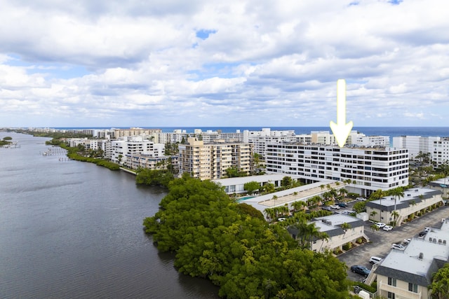 drone / aerial view with a water view