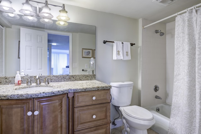 full bathroom featuring vanity, shower / bathtub combination with curtain, and toilet