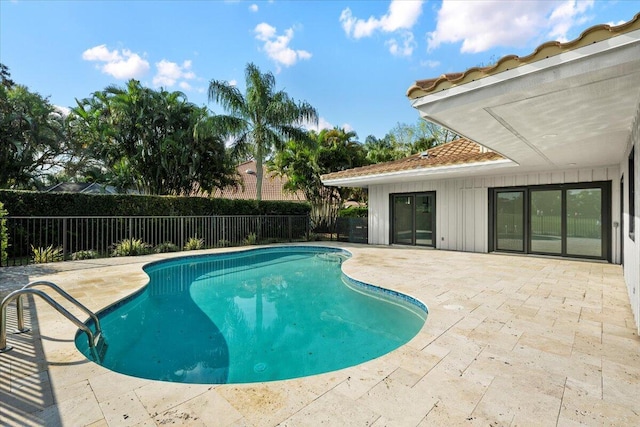 view of pool featuring a patio