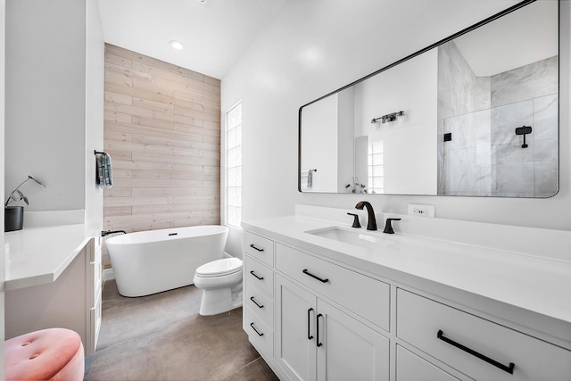 bathroom featuring wood walls, a tub, concrete floors, vanity, and toilet