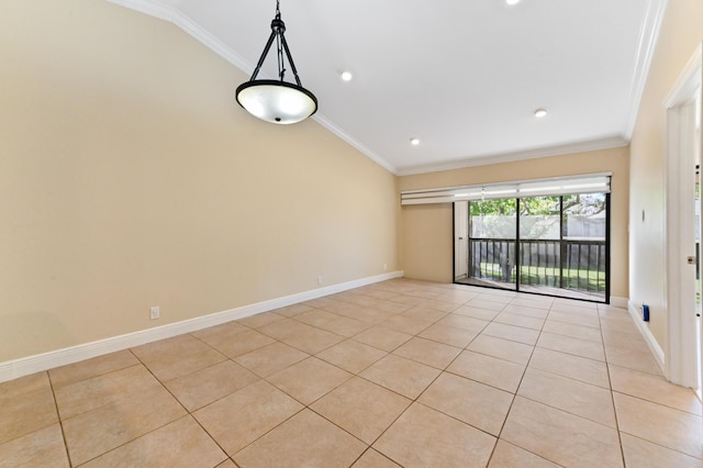 unfurnished room with crown molding, baseboards, and light tile patterned floors