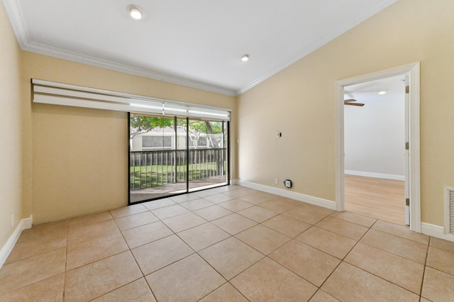 tiled spare room featuring baseboards, ornamental molding, and visible vents