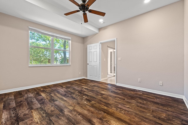 empty room featuring ceiling fan and hardwood / wood-style floors