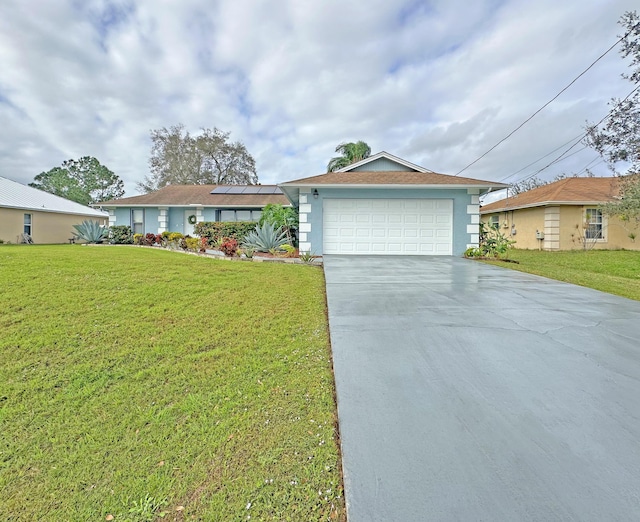 ranch-style home with a front yard and solar panels