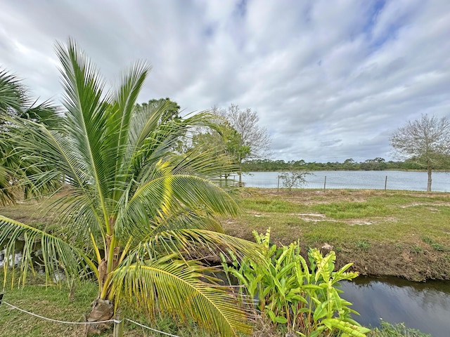 view of yard with a water view