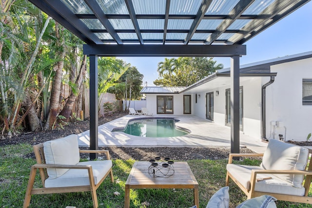 view of swimming pool featuring a pergola and a patio