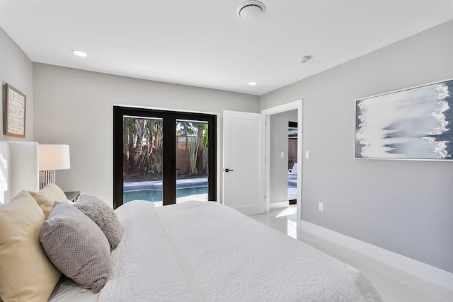 bedroom featuring access to outside and french doors