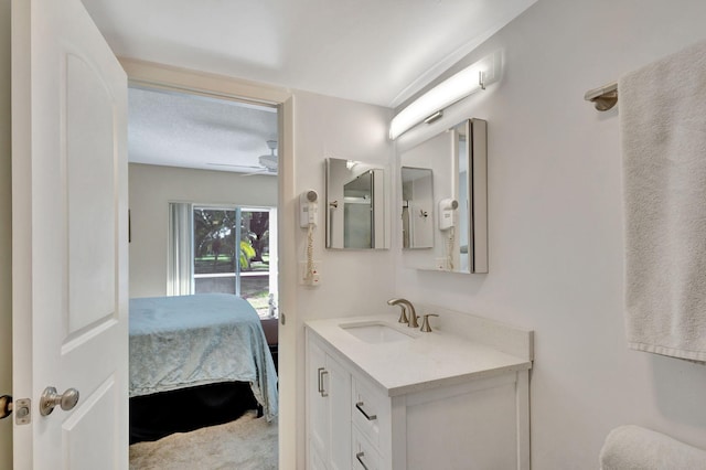 bathroom with vanity and ceiling fan