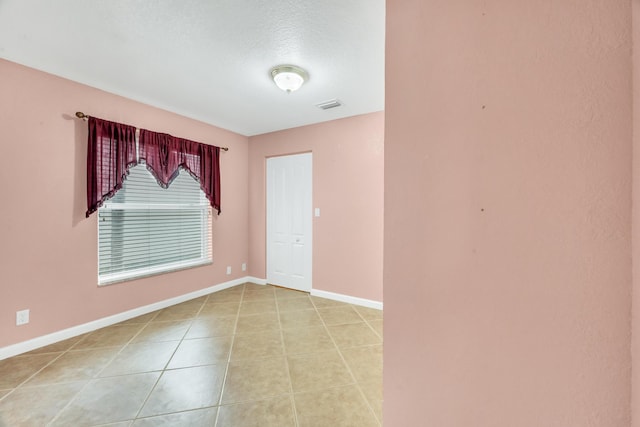 view of tiled empty room