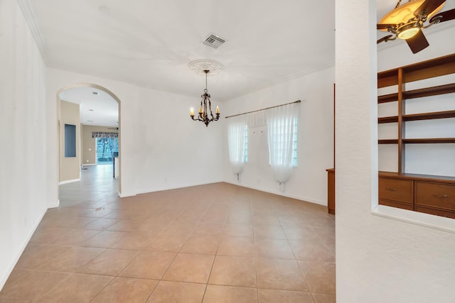 spare room with light tile patterned floors and ceiling fan