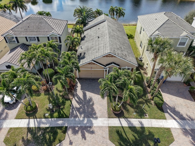 birds eye view of property featuring a water view