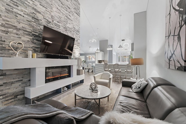 living room with a towering ceiling