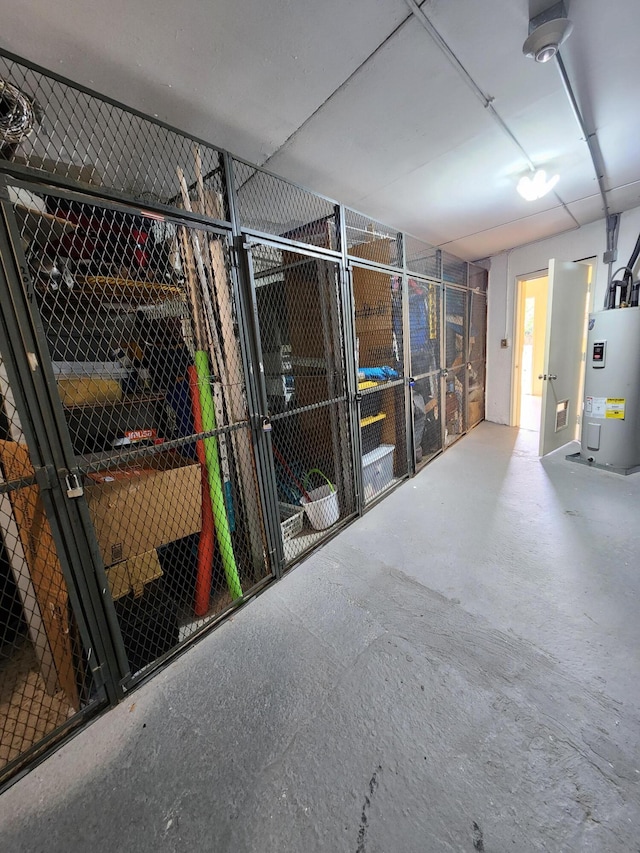 storage room featuring water heater