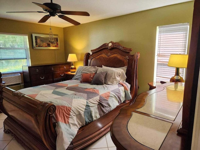 bedroom with light tile patterned floors and ceiling fan