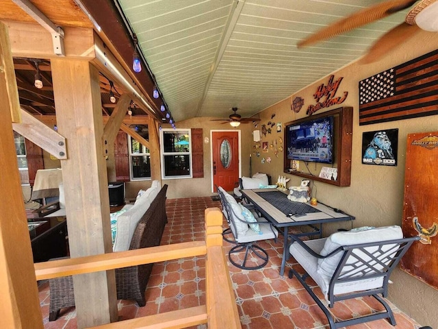 view of patio featuring ceiling fan