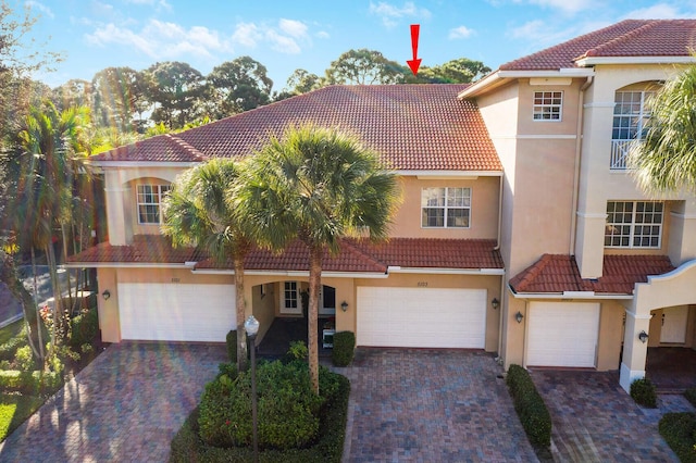 5103 Artesa Way W, Palm Beach Gardens, FL 33418 - mediterranean / spanish home with a garage