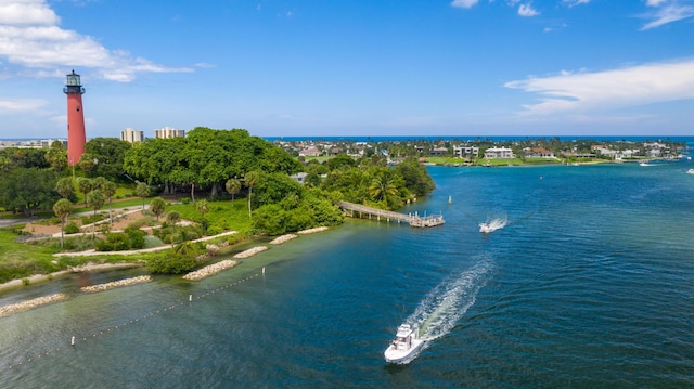 birds eye view of property featuring a water view