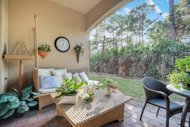 balcony featuring an outdoor hangout area and a patio area