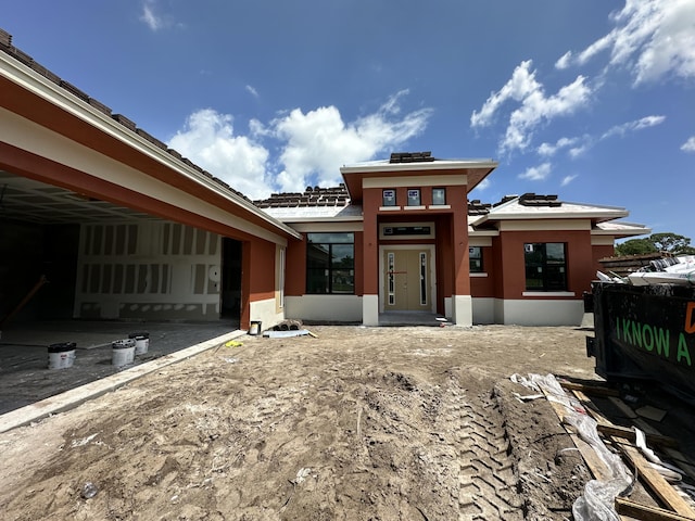 view of front of house with stucco siding