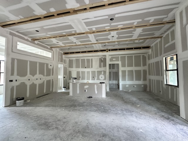 misc room with a garage