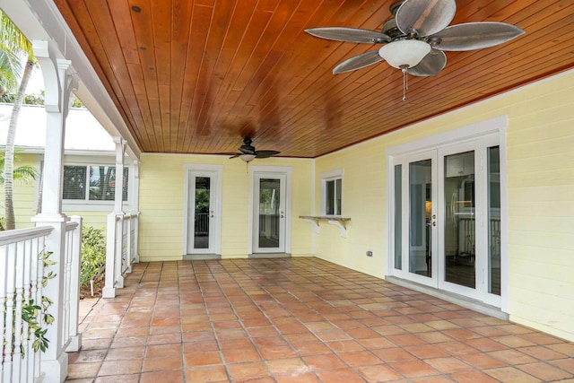 view of patio / terrace featuring ceiling fan and french doors