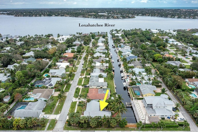 bird's eye view with a water view