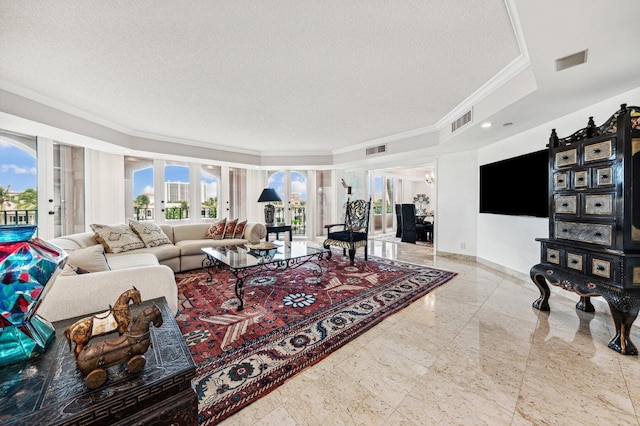 living room featuring ornamental molding, a textured ceiling, and french doors