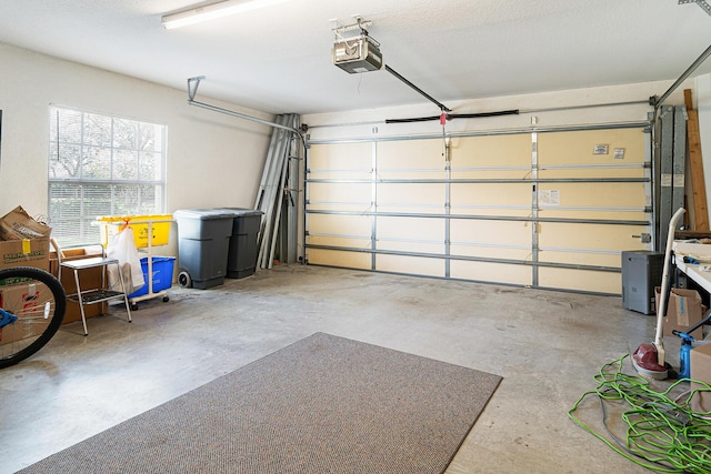 garage featuring a garage door opener