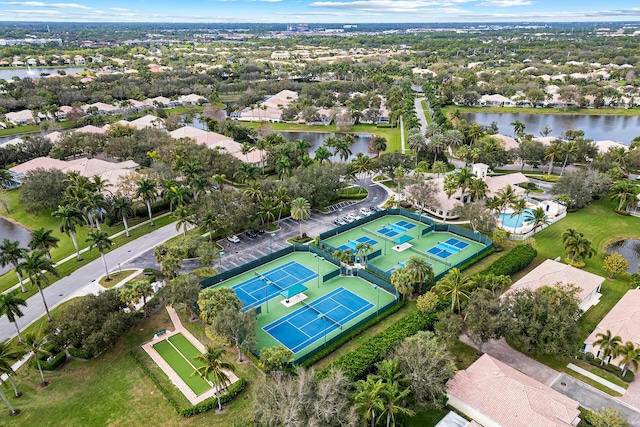 birds eye view of property featuring a water view and a residential view