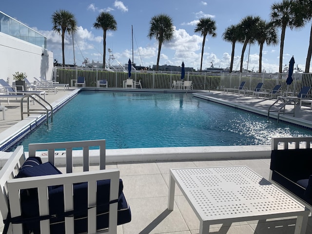 view of swimming pool featuring a patio