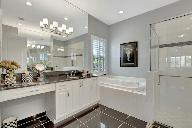 bathroom with vanity, tile patterned floors, and separate shower and tub