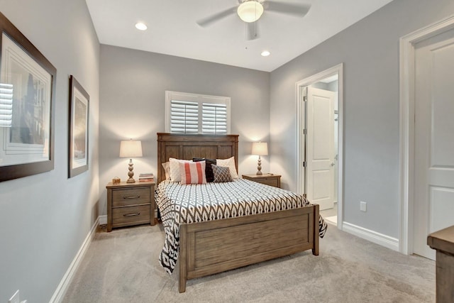 bedroom with ceiling fan and light carpet