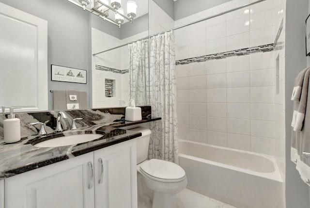 full bathroom with vanity, shower / bath combination with curtain, and toilet