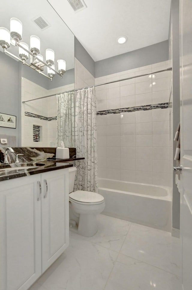 full bathroom featuring shower / tub combo with curtain, vanity, and toilet