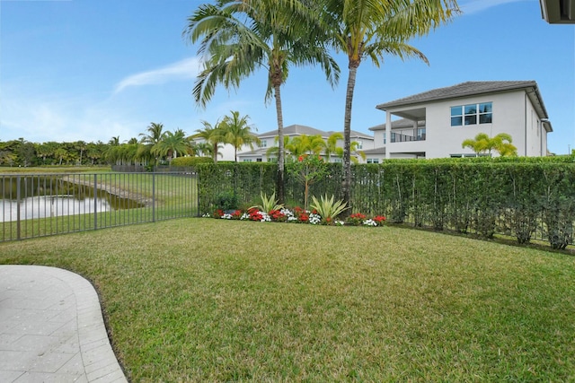 view of yard with a water view