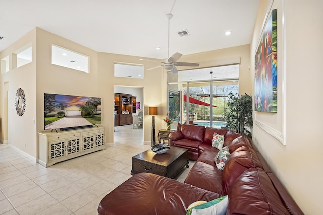 tiled living room with recessed lighting, baseboards, visible vents, and ceiling fan