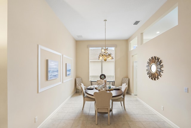 dining area featuring a notable chandelier, baseboards, visible vents, and light tile patterned floors