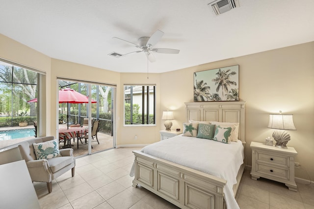 bedroom with light tile patterned floors, visible vents, baseboards, and access to exterior