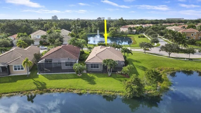 drone / aerial view with a water view