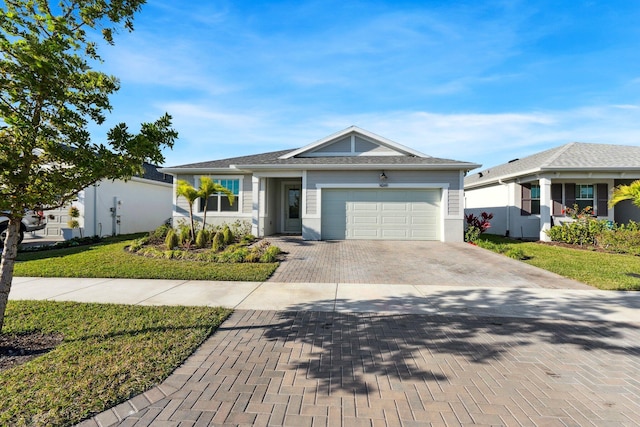 ranch-style house featuring a garage