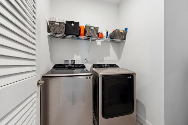 laundry room with washer and dryer