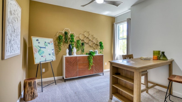 interior space with ceiling fan and carpet floors