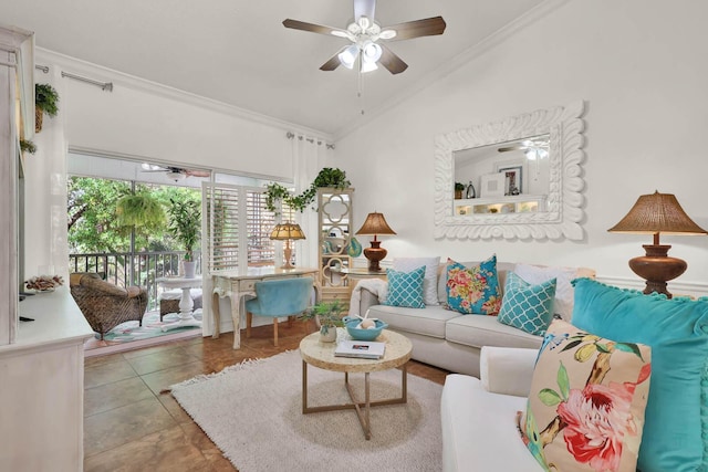 living room with crown molding, ceiling fan, tile patterned flooring, and vaulted ceiling