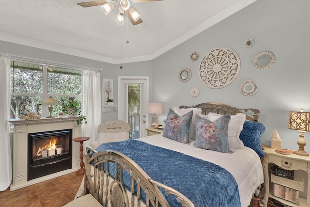 bedroom featuring access to outside, ornamental molding, and ceiling fan