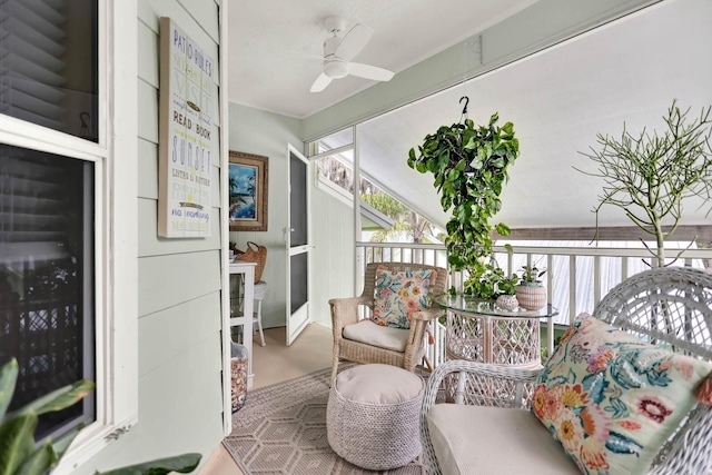 sunroom with ceiling fan