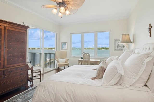 bedroom with a water view, wood-type flooring, access to outside, ornamental molding, and ceiling fan