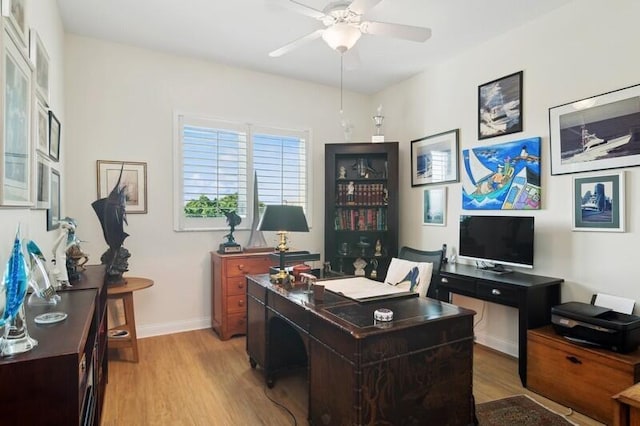 office area with ceiling fan and light wood-type flooring