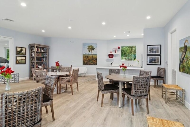 dining room featuring light wood-type flooring