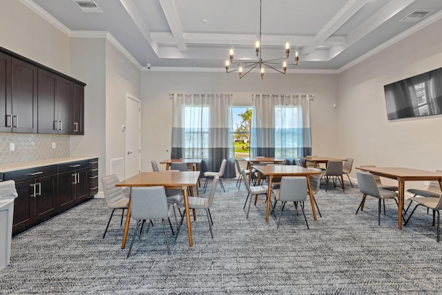 dining room with beamed ceiling, ornamental molding, coffered ceiling, and an inviting chandelier