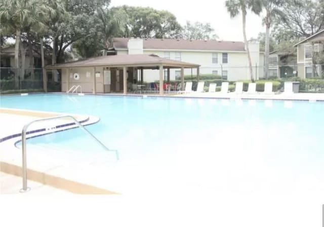 view of swimming pool featuring a gazebo